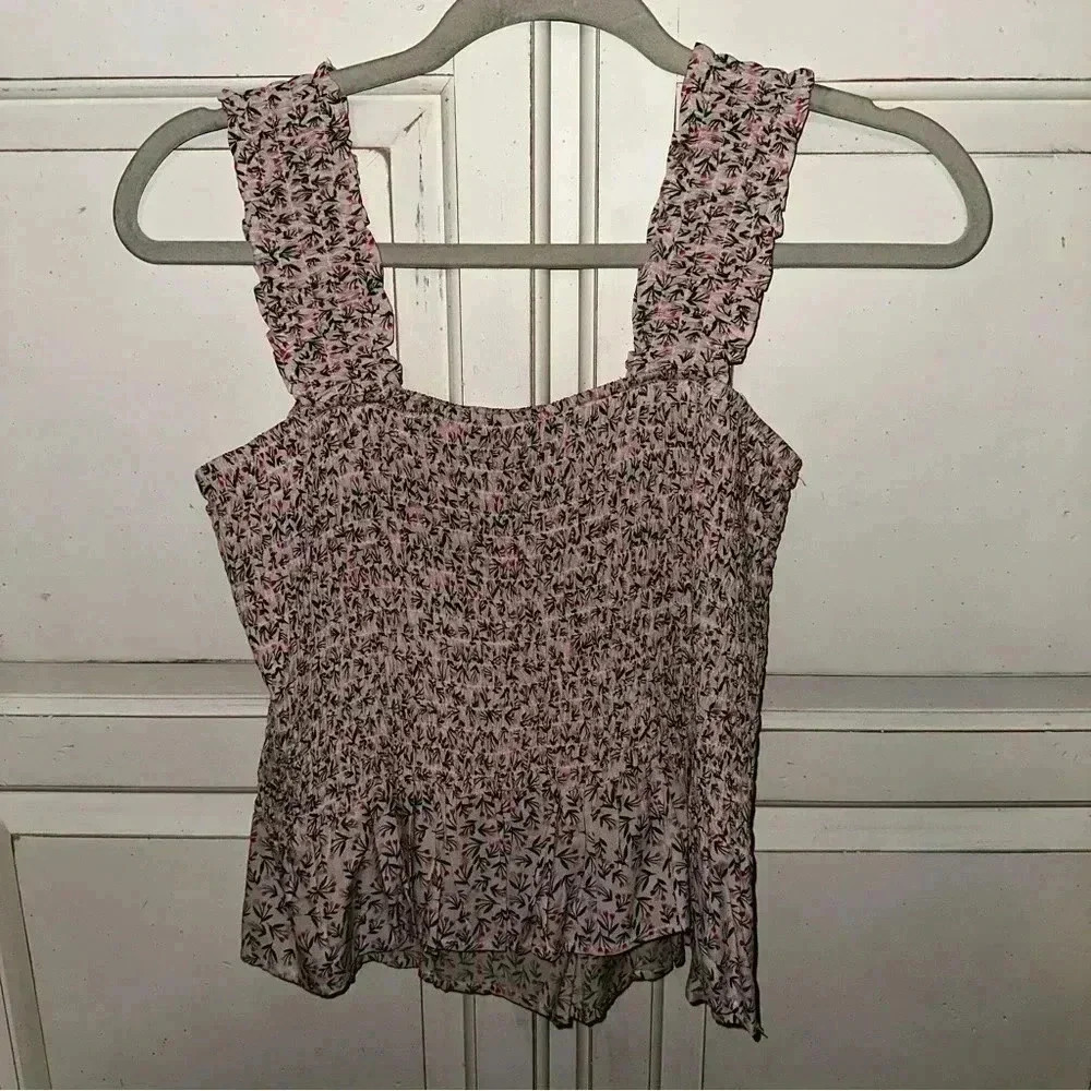 Aqua Pink Stretchy top with frilly sleeves and flower detailing